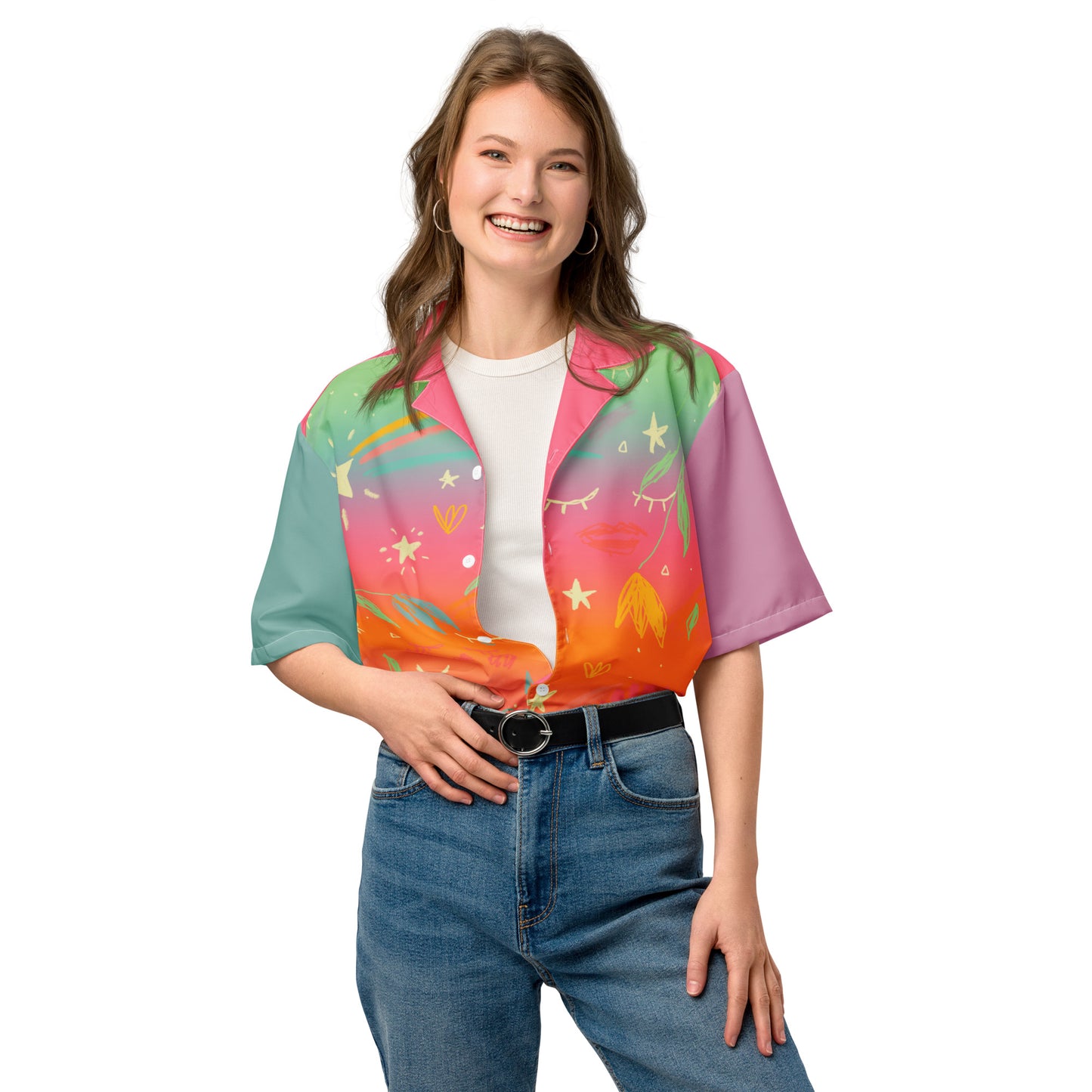 A model with light skin is wearing a colorful rainbow gradient button down shirt with jeans.