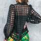 FLUTTERING ON WOVEN TOP