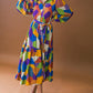 REMARKABLE FLAIR WOVEN MIDI DRESS
